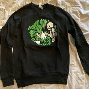 Size small sweatshirt. Worn a couple times.